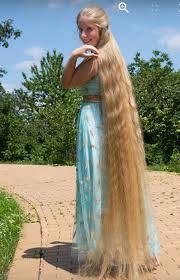 Why Are Most Women With Floor Length Hair Blondes I Need To Work On This I Seem To Be Stuck At Waist Le Long Hair Models Long Hair Styles Rapunzel Long Hair