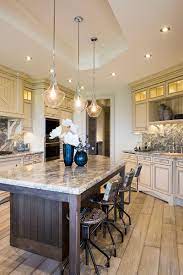 Check spelling or type a new query. Upscale French Country Elegance With A Stone Topped Island Sleek Gla Dream Kitchen Luxury French Country French Country Light Fixtures French Country Kitchens