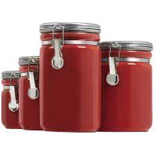 These vintage hand painted faux books provide storage. 4 Piece Kitchen Canister Set Ceramic Canisters Kitchen Canisters Ceramic Kitchen Canisters