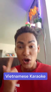 Vietnamese Singer with Mustache Singing Karaoke