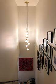 Stairway Chandelier Long Cascading Foyer Lighting 7 Cluster Hanging Pendant Lighting Modern Chandelier Cloth Cords Copper Dipped Led Globes In 2021 Stairway Lighting Long Pendant Lights Hallway Lighting