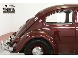 Image result for Bordeaux Red 1950 Beetle