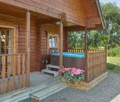 It is a quiet location surrounded by countryside and local woodland walks are nearby. Log Cabins And Lodges With Hot Tubs Jacuzzi S Sauna S