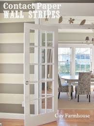 29 Ways To Decorate Your Rental With Contact Paper Striped Walls Apartment Decor Home Decor