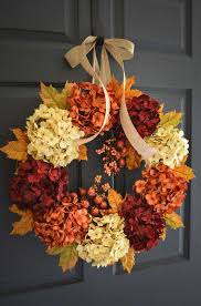 This front door welcome sign is one of the most charming diys we've ever seen. Thanksgiving Wreath Of Flowers Beautiful Front Door Decor Ideas