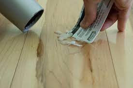 Mix a solution of 2 cups vinegar per gallon of hot water, dip a cloth in the solution, wring it well and rub along the planks in one direction only, not back and forth. How To Remove Candle Wax From Hardwood Floors Hgtv