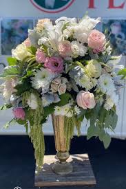 Artificial flowers provide you with the ability to show off your artistic side by creating decorative pieces or bringing character to household decor that you are showing off. Gold Vase With Floral In Oxnard Ca Casa Blanca Flowers