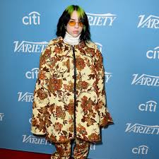 Oversized white hoodie with orange and green grafitti billie eilish on front. Billie Eilish Accepted Billboard S Woman Of The Year Award In A Very Practical Prada Outfit Vogue