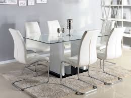 La cuisine, souvent plus confinée que la salle à manger est un lieu de partage. Table A Manger Marisa 6 Couverts Verre Trempe Et Mdf Laque Blanc Http Www Vente Unique C Mobilier De Salle A Manger Salle A Manger Blanche Table A Manger