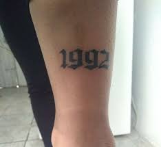 This style is simple and only includes the actual words without any other imagery; Tattoo 1992 Tattoos Tattoos For Guys Tattoo Font