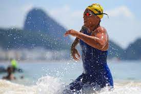 A brasileira faturou a medalha de ouro na disputa da prova de 10 quilômetros ao vencer com o tempo de e 2h06min08s5. Veipnynwcxhuem