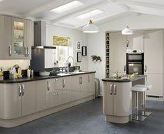 White remains a more popular choice for areas that are going to be decked out in white, black and grey. 7 Howdens Ivory Ideas Howdens Kitchens Kitchen Suppliers Kitchen Collection