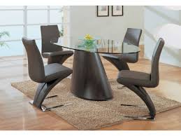 Glass top dining table with metallic base and retro elegance. 15 Elegant Dining Table And Chairs Top Dreamer
