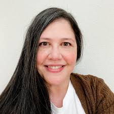 ABOUT — JULIE EBERSOLE