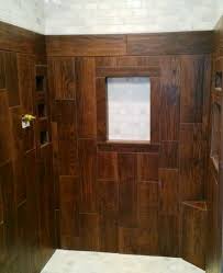 Shower Stall Ceramic Tile That Looks Like Wood Also Used Subway Marble Tiles And 2x2 Marble Tiles For Ceilin Wood Tile Shower Shower Tile Primitive Bathrooms