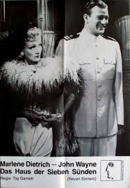Die mädchen hingegen teilen ihre geheimnisse, ihre ängste, ihre lust und ihren schmerz miteinander. Das Haus Der Sieben Sunden Plakat Marlene Dietrich John Wane Poster