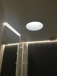 Lines Of Light In Ceiling Above Mirror Shower Wc As Well As In Niches Source Of Natural Light Sun Tunnel Cleverly Disguised As Skylight Light Wall Lights