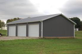 Metal barns , barn builders , pole barn construction , pole barn garage , garage construction , pole barn builders , horse barn builders A 32x40x10 Garage With 3 Bays In Pole Barns Direct Facebook