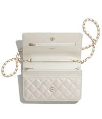 Perhaps the biggest difference is the structure of the interior. Classic Wallet On Chain Iridescent Calfskin Gold Tone Metal Chanel