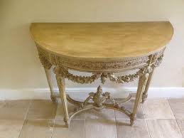 Maybe you would like to learn more about one of these? A Fabulous Highly Decorative Antique Cream 19th Century French Carved Wood Painted Demi Lune Console Table Antique English Antique Mirrors