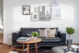 This gorgeous cherry wood dining set is employing a few of our best tricks for lightening up — the pale flooring, white walls, and black chairs with metal accents, a black rug and black coffee table. Pin By Pengpeng Chou On Habitat Leather Sofa Living Room Black Sofa Living Room Black Leather Sofa Living Room