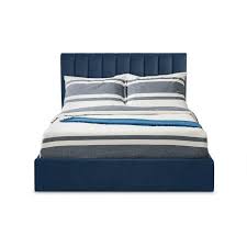 Il letto lummi con testiera contenitore è caratterizzato da una testata in legno che permette di conservare libri e oggetti. Letto Contenitore Songe Testata Velluto Blu 160 Cm