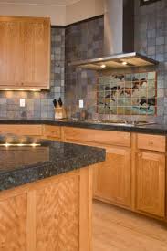 western tile mural in kitchen