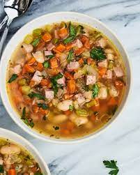 A Simmering Pot Of Ham And Bean Soup Is The Absolute Best Use For Leftover Ham Ham And Bean Soup Leftover Ham Recipes Bean Soup Recipes