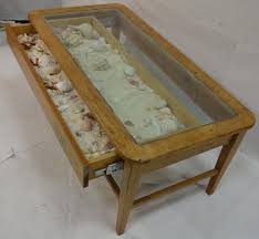 You can also mix in a few other things if you'd like. Sold Price Vintage Coffee Table W Seashells Under Glass Top March 3 0114 6 00 Pm Edt