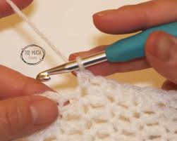 Carry the unworked yarns up the side and then cover with a border to minimize the number of yarn tails you need to weave in at the end. How To Make A Crochet Cross Baby Blanket Free Pattern Too Much Love