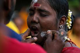 No pain? How extreme body piercing of Thaipusam Hindu festival devotees  hurts piercers more than pilgrims