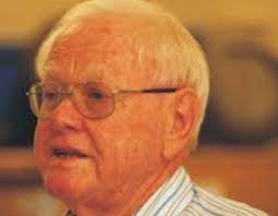 Curtis J. Schmidt, Zoological Collections Manager of the Sternberg Museum  of Natural History, and two-time KHS president, entering data from Aaron  Short into the FHMNH collection ledger.