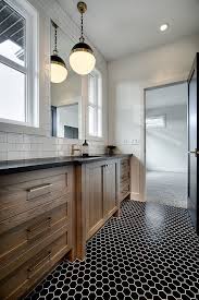 Black And White Farmhouse Bathroom Ideas Modern Farmhouse Bathroom With A Large Rough Sawn White Oak Vanity Leathered Blac Modern Farmhouse Bathroom Black Granite Countertops Bathroom Interior Design