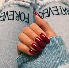 Acrylic Red Nails On Dark Skin Nail And Manicure Trends Add some pizzazz with a sharp, silver cutout design like this.