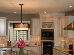 The distinct beauty of its reclaimed wood. Kraftmaid Maple Amhurst Canvas With Cherry Rutherford Vintage Onyx Island Kitchens Baths By Greta