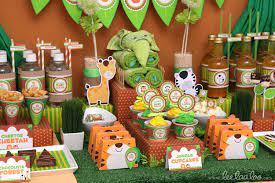 Aside from the cake being covered with rich fondant icing, place animal toppers on your cake to complete the safari your venue decorations will need to be safari themed as well. Safari Jungle Theme Baby Shower Novocom Top