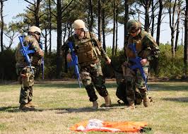 File:US Navy 110318-N-8949D-085 Master-at-Arms 1st Class Neil McLean,  right, and Electrician's Mate 2nd Class Allen Hodges, center.jpg