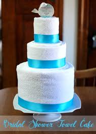 Repeat the folds only use a hand towel for the top of the cake. 10 Irish Wedding Cakes Made Out Of Towels Photo Wedding Cake Made Out Of Towels Bridal Shower Cake Made Out Of Towels And Bridal Shower Towel Cake Snackncake