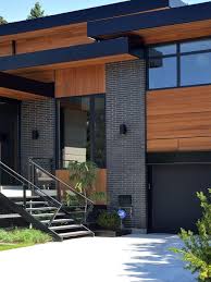 Black And Grey Brick Houses Gray Brick Black Trim Cedar Siding Facade House Architecture House House Exterior
