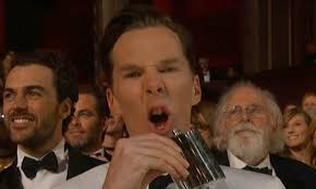Benedict Cumberbatch swigs from a hip-flask during Oscars ceremony