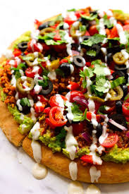 Vegan Nacho Pizza Is A Pizza With Nacho Toppings Am I Blowing Your Mind Right Now A Pizza Crust Slathered With Gu Vegan Nachos Vegan Pizza Recipe Vegan Pizza