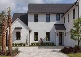 Check spelling or type a new query. Modern Farmhouse With White Stucco Black Windows And Black Roof Modern Farmhouse With White Stucco White Stucco House Modern Farmhouse Exterior Stucco Homes