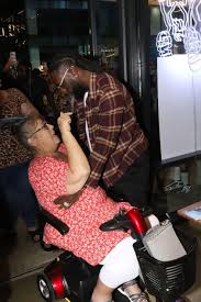 Gentle Giant-Burna Boy left his hotel room and stepped out to spend time  with a physically challenged fan – A-Choices Magazine