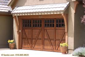 And it only takes a couple of hours. Painting A Garage Door To Look Like Wood Painting Inspired