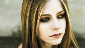 Avril lavigne black quilted leather biker jacket pin by sobareiiro on rock clothing | hair inspo color. 2560x800px Free Download Hd Wallpaper Woman S Brown Hair Avril Lavigne Face Look Make Up Women Wallpaper Flare