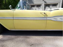 Image result for Starlight Yellow 1957 Pontiac