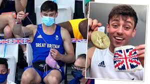 2 days ago · tom daley shown in the stands with knitting needles and a handmade creation. Qelu3yypgcwzdm
