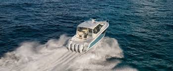 This adventurous boat is so much more than a cabin cruiser: 405 Conquest Sport Cabin Cruiser Boat Boston Whaler