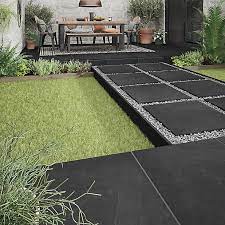 So get ready to hear those glasses clinking and children playing whilst you relax on your fabulously stylish outdoor patio and garden tiles. Slate Black Matt Stone Effect Porcelain Outdoor Floor Tile Pack Of 2 L 600mm W 600mm Diy At B Q