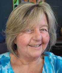 Should windows be lowered to match door height in living room design?